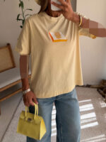 CATTLEYA × Eleven Tee | Lemon Page - Image 2